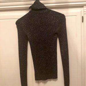 Express black turtleneck with silver sparkles